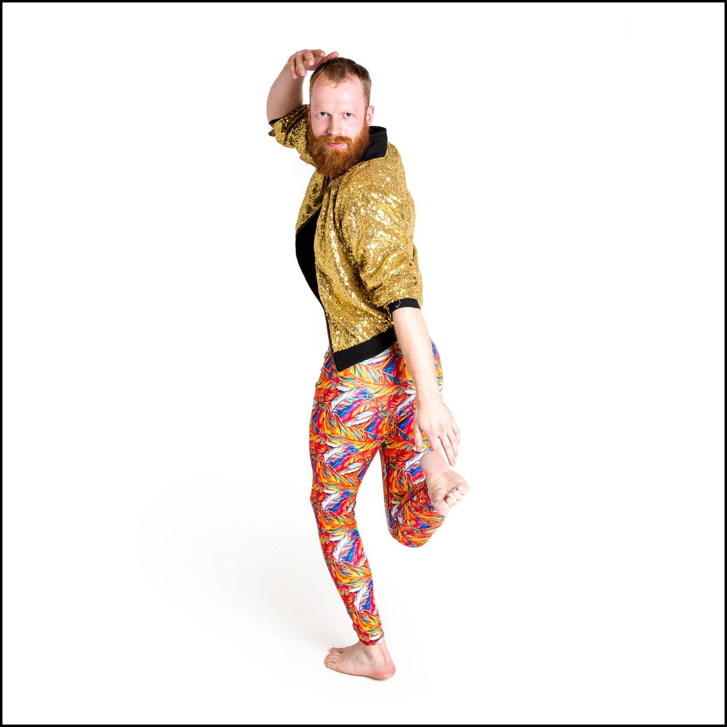 Phoenix Leggings, a handmade-to-order piece in multicoloured feather printed spandex. These bold leggings are both stylish and sustainable. The unisex design features a high elasticated waist.