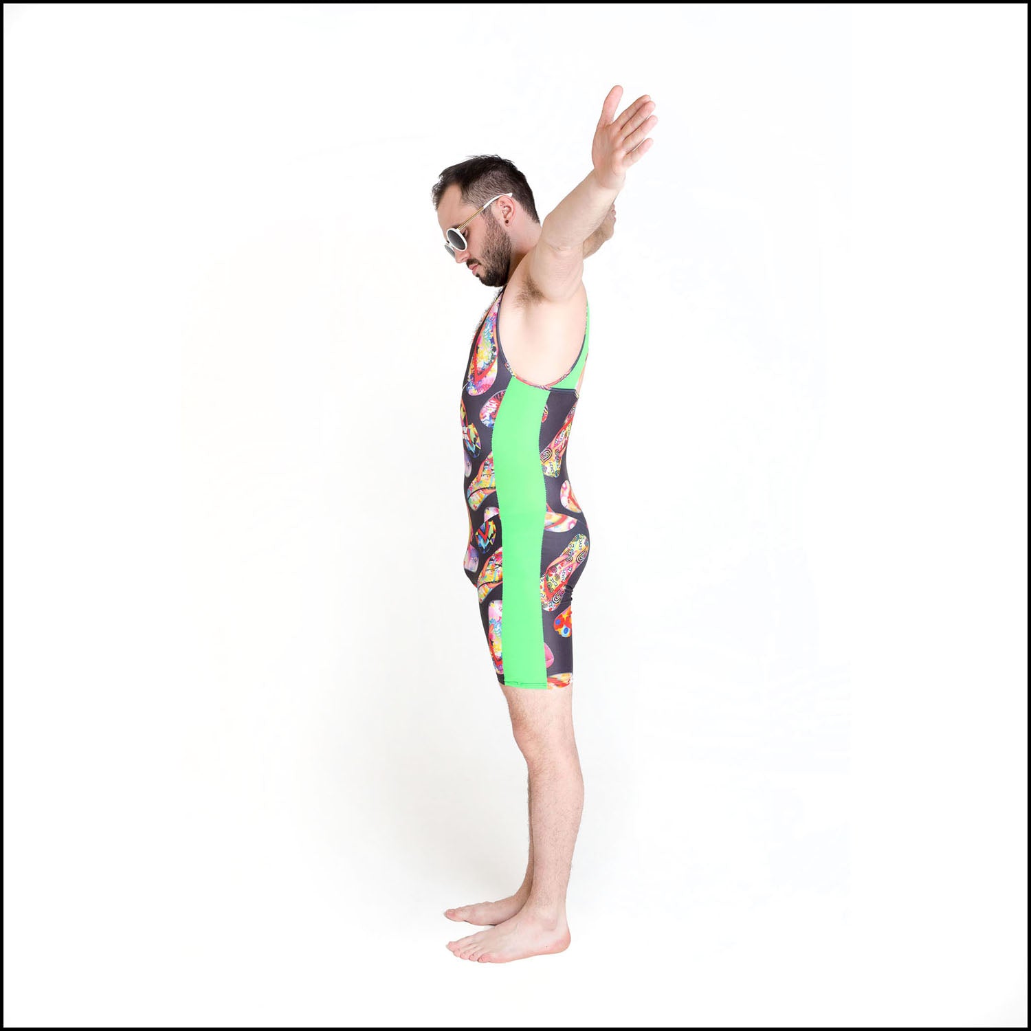 Diverse AF Catsuit. Handmade-to-order using colourful flipflop printed spandex, this tongue-in-cheek, cropped catsuit is both stylish and sustainable. The unisex design features a supportive racer back and figure flattering, neon green, contrast side panels.
